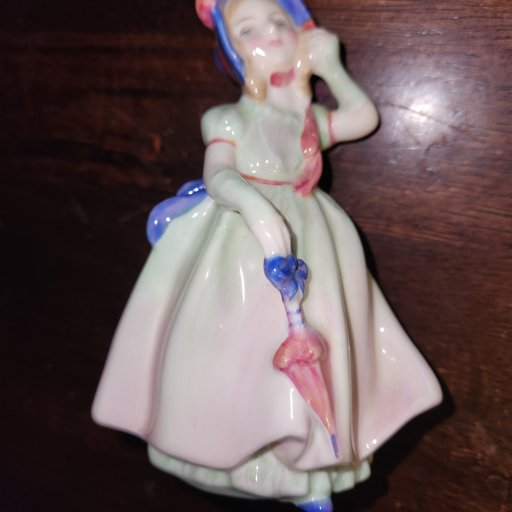 Royal Doulton Porcelain Figurine with Pink and Blue Accents